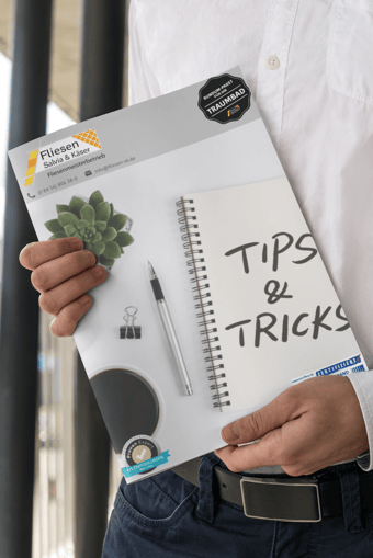 mockup-of-a-formal-man-holding-a-magazine-3388-el1